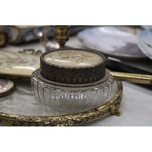 212 - A VINTAGE 'PETIT-POINT' DRESSING TABLE SET TO INCLUDE, CANDLESTICKS, A HAND MIRROR, LIDDED TRINKET J... 