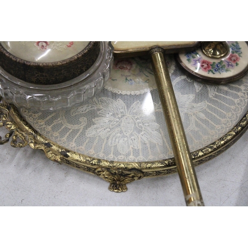 212 - A VINTAGE 'PETIT-POINT' DRESSING TABLE SET TO INCLUDE, CANDLESTICKS, A HAND MIRROR, LIDDED TRINKET J... 