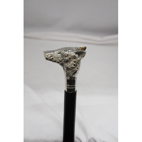 216 - A WALKING STICK WITH A CHROME WOLF HANDLE