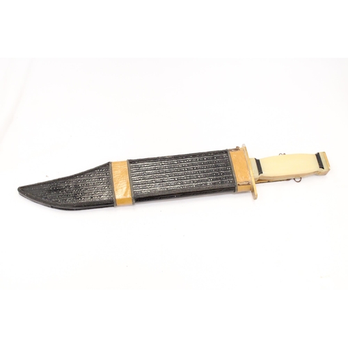 226 - A BOWIE KNIFE IN SHEATH - APPROXIMATELY 40CM LONG