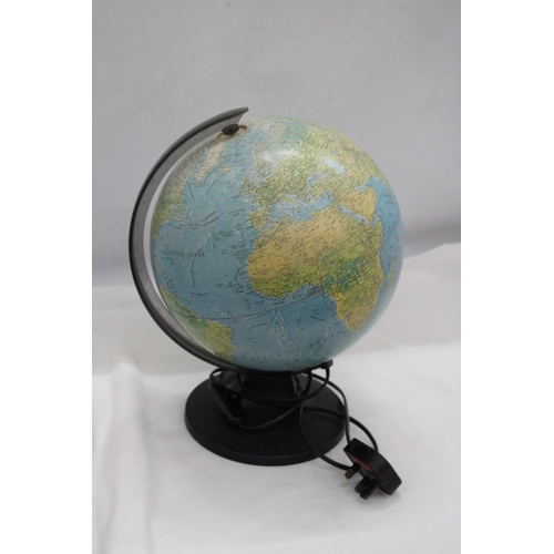 250 - A ROTATING ILLUMINATED GLOBE - APPROXIMATELY 32CM HIGH