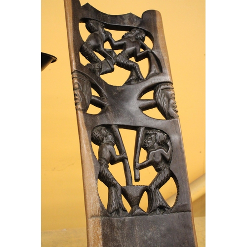 260 - A VERY HEAVY CARVED AFRICAN BIRTHING CHAIR -APPROXIMATELY 91M