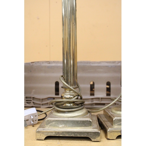 269 - A PAIR OF HEAVY BRASS PEDESTAL ELECTRIC CANDLE STICKS LAMPS - APPROXIMATELY 47CM HIGH