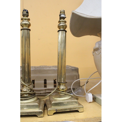 269 - A PAIR OF HEAVY BRASS PEDESTAL ELECTRIC CANDLE STICKS LAMPS - APPROXIMATELY 47CM HIGH