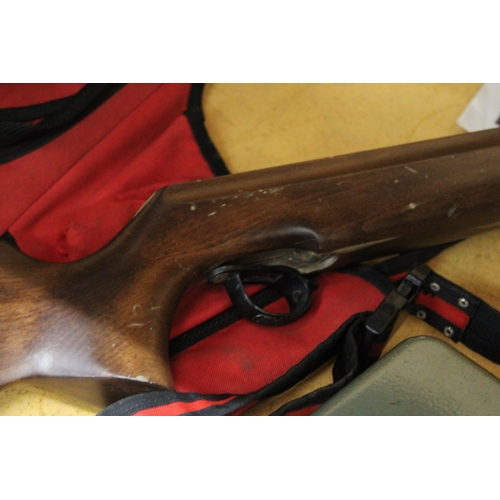 277 - A HARDWOOD RIFLE STOCK AND A LONGSHOT SHOULDER BAG FOR ARROWS