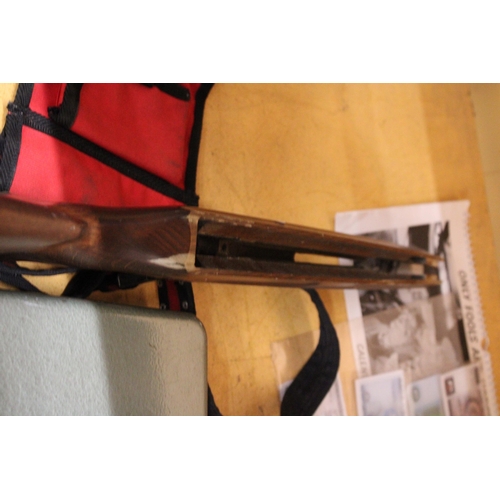 277 - A HARDWOOD RIFLE STOCK AND A LONGSHOT SHOULDER BAG FOR ARROWS