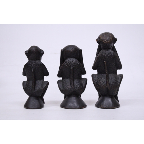 395 - A SET OF THREE TRIBAL MONKEY FIGURES, HEAR NO EVIL, SPEAK NO EVIL AND HEAR NO EVIL