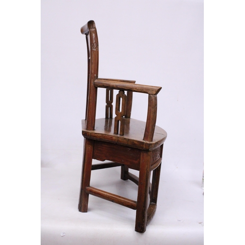 397 - A CHINESE ELM CARVED CHILDS CHAIR