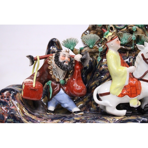 399 - A CHINESE PORCELAIN LARGE FIGURAL GROUP OF MYTHICAL CHINESE CHARACTERS