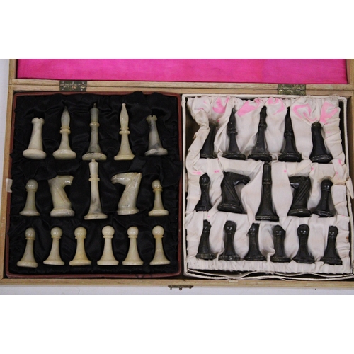 404 - A CHINESE CASED AND BOXED CHESS SET WITH JADEITE PIECES