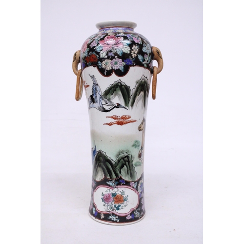 410 - A LARGE POLYCHROME ENAMEL HAND PAINTED CHINESE VASE WITH ELEPHANT HANDLE