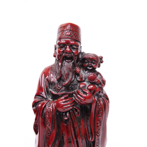 412 - TWO HEAVY RED RESIN MANDARIN FIGURES 9 INCH (H)