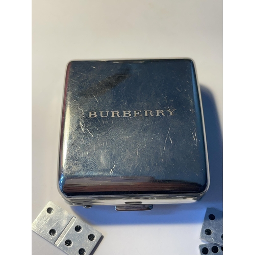 567 - A VINTAGE BURBERRY MINIATURE POCKET SIZED DOMINO SET WITH TWENTY SEVEN DOMINOES