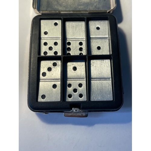 567 - A VINTAGE BURBERRY MINIATURE POCKET SIZED DOMINO SET WITH TWENTY SEVEN DOMINOES