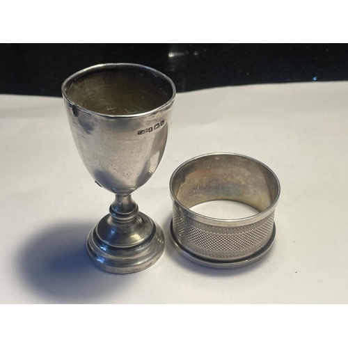 606 - TWO HALLMARKED BIRMINGHAM SILVER ITEMS TO INCLUDE AN ENGRAVED NAPKIN RING AND AN ENGRAVED CUP GROSS ... 