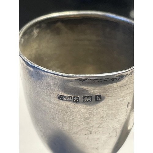 606 - TWO HALLMARKED BIRMINGHAM SILVER ITEMS TO INCLUDE AN ENGRAVED NAPKIN RING AND AN ENGRAVED CUP GROSS ... 