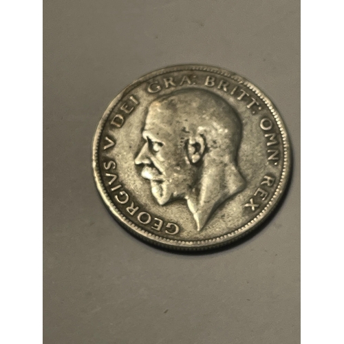 610 - A SILVER 1929 HALF CROWN