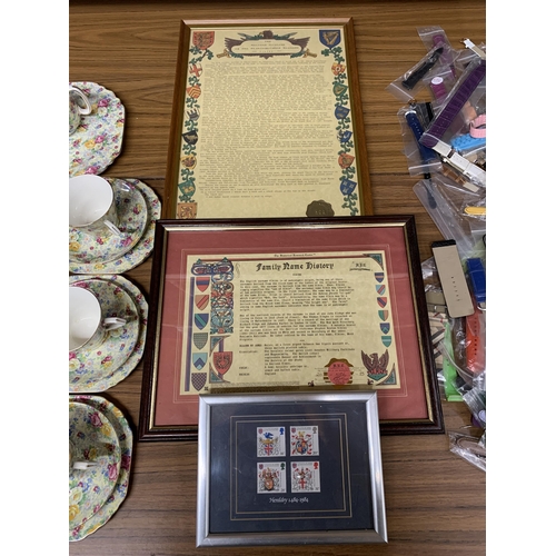 1289 - TWO FRAMED FAMILY HISTORY DOCUMENTS FOR THE NAME 'ELKINS' PLUS A SET OF FOUR HERALDRY STAMPS