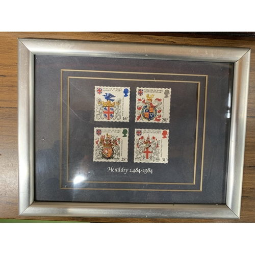 1289 - TWO FRAMED FAMILY HISTORY DOCUMENTS FOR THE NAME 'ELKINS' PLUS A SET OF FOUR HERALDRY STAMPS