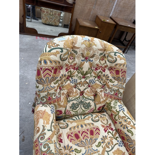 A MODERN FLORAL EASY CHAIR