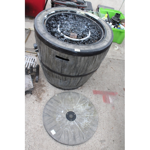 1708 - A DECORATIVE BARREL STYLE GAS FIRE PIT