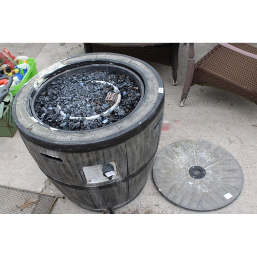 1708 - A DECORATIVE BARREL STYLE GAS FIRE PIT