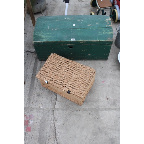 1804 - A VINTAGE WOODEN STORAGE TRUNK AND A WICKER HAMPER BASKET