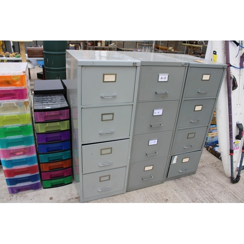 1980 - THREE VINTAGE METAL FOUR DRAWER FILING CABINETS