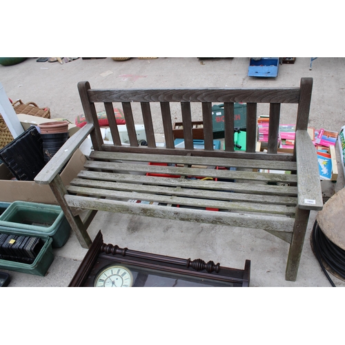 1993 - A WOODEN TWO SEATER GARDEN BENCH