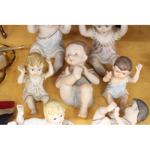 282 - THREE LARGE AND FOUR SMALL ANTIQUE PORCELAIN, BISQUE DOLLS