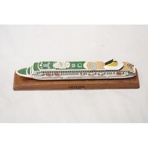 291 - A HEAVY SOLID OCEAN LINER ON WOODEN STAND (ARTEMIS), LENGTH 26CM, HEIGHT 6CM