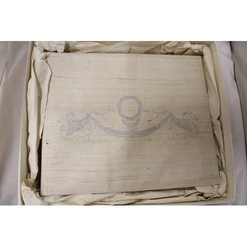 299 - A LARGE PHOTOGRAPH ALBUM WITH AN EMBROIDERED SILK COVER