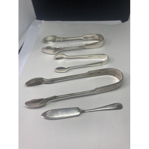 468 - FOUE SILVER PLATED ITEMS TO INCLUDE THREE SETS OF NIPS AND A BUTTER KNIFE