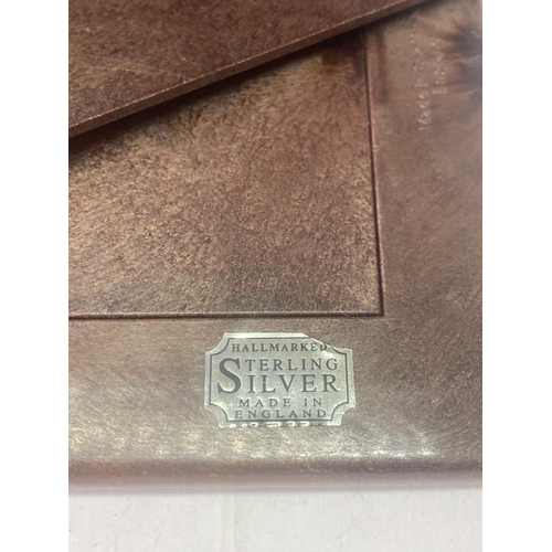 495 - A HALLMARKED SHEFFIELD SILVER PHOTOGRAPH FRAME TO HOLD A 3.5