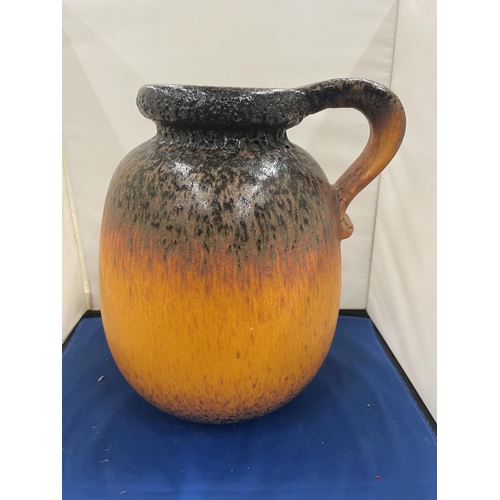 75 - A LARGE STUDIO POTTERY JUG