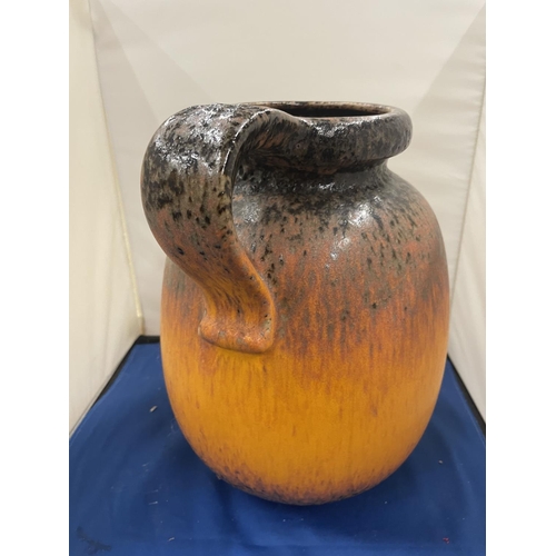 75 - A LARGE STUDIO POTTERY JUG