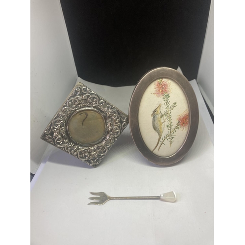 479 - TWO HALLMARKED SILVER SMALL PHOTOGRAPH FRAMES AND A PICKLE FORK