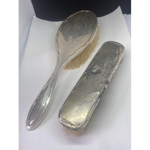 485 - TWO HALLMARKED SILVER BRUSHES TO INCLUDE A HAIRBRUSH AND CLOTHES BRUSH