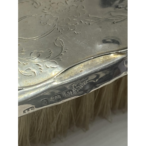 485 - TWO HALLMARKED SILVER BRUSHES TO INCLUDE A HAIRBRUSH AND CLOTHES BRUSH