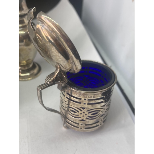 489 - TWO HALLMARKED SILVER POTS (ONE WITH BLUE GLASS LINER) AND A HALLMARKED LONDON PEPPER POT GROSS WEIG... 