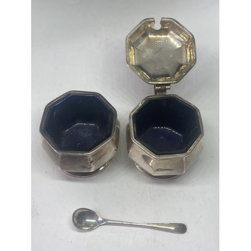 496 - THREE HALLMARKED BIRMINGHAM SILVER ITEMS TO INCLUDE TWO CRUETS WITH BLUE GLASS LINERS AND A SPOON GR... 