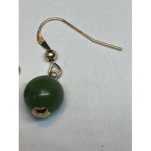 509 - A PAIR OF MARKED 9K EARRINGS WITH GREEN CHALCEDONY STONES