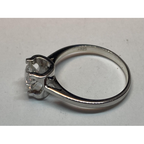 510 - A MARKED 925 RING WITH A ONE CARAT SOLITAIRE MOISSANITE SIZE N/O IN A PRESENTATION BOX WITH A GMA CE... 