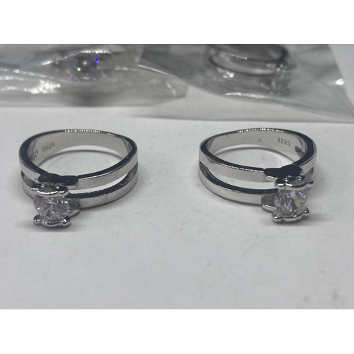 582A - FOUR MARKED S925 RINGS WITH CLEAR STONES