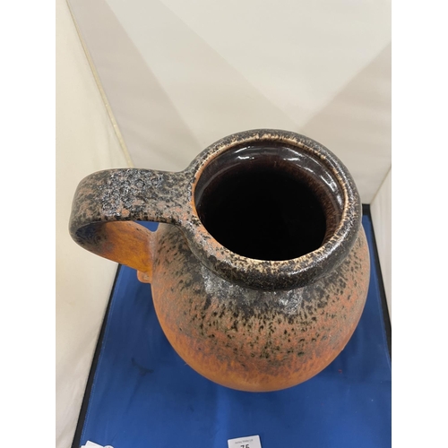 75 - A LARGE STUDIO POTTERY JUG