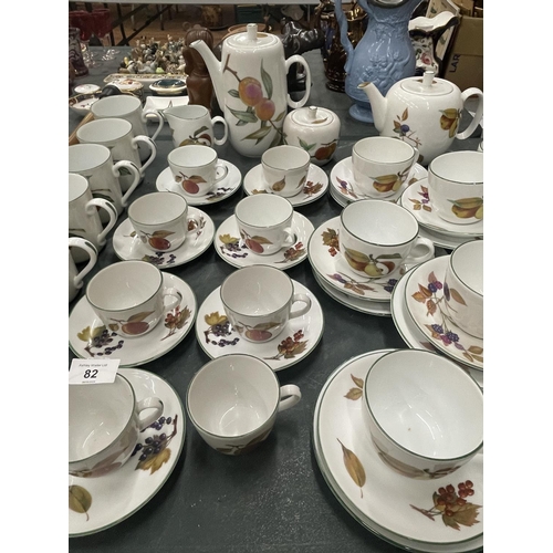 82 - A LARGE COLLECTION OF ROYAL WORCESTER EVESHAM TEA AND COFFEE WARE TO INCLUDE TEAPOT, COFFEE POT, MIL... 