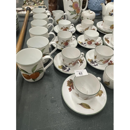 82 - A LARGE COLLECTION OF ROYAL WORCESTER EVESHAM TEA AND COFFEE WARE TO INCLUDE TEAPOT, COFFEE POT, MIL... 