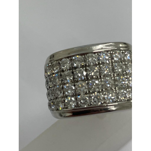 464 - A GENTLEMAN'S 14 CARAT WHITE GOLD RING SET WITH APPROXIMATELY 5 CARATS OF BRILLIANT CUT DIAMONDS, CO... 