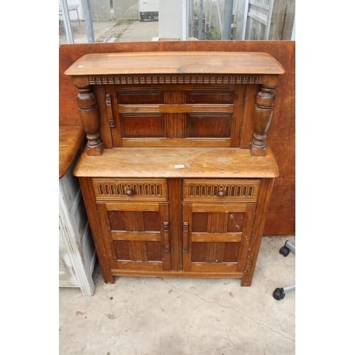 3139 - AN OAK JACOBEAN COURT CUPBOARD