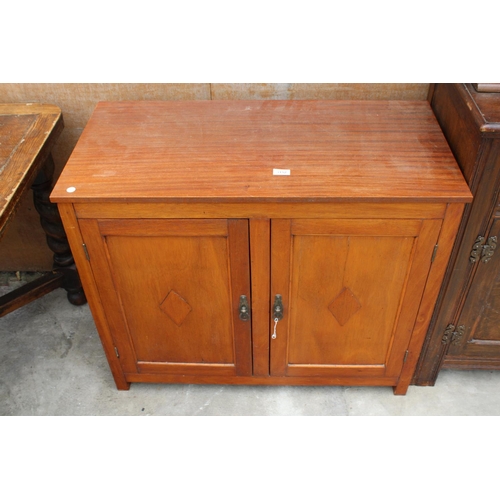 3152 - A TWO DOOR TEAK CABINET 36